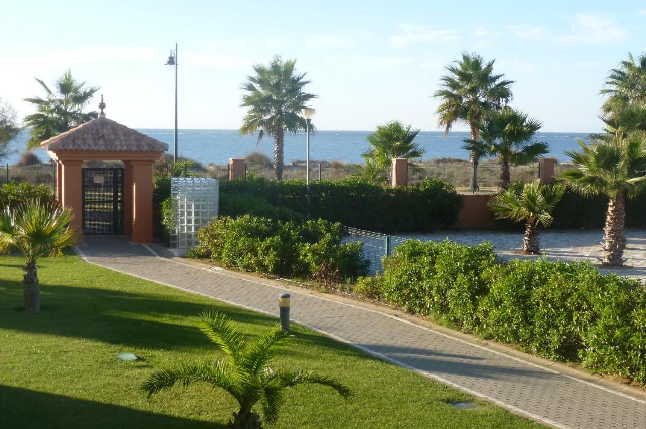 Urbanización Las Arenas Isla Canela Exterior foto